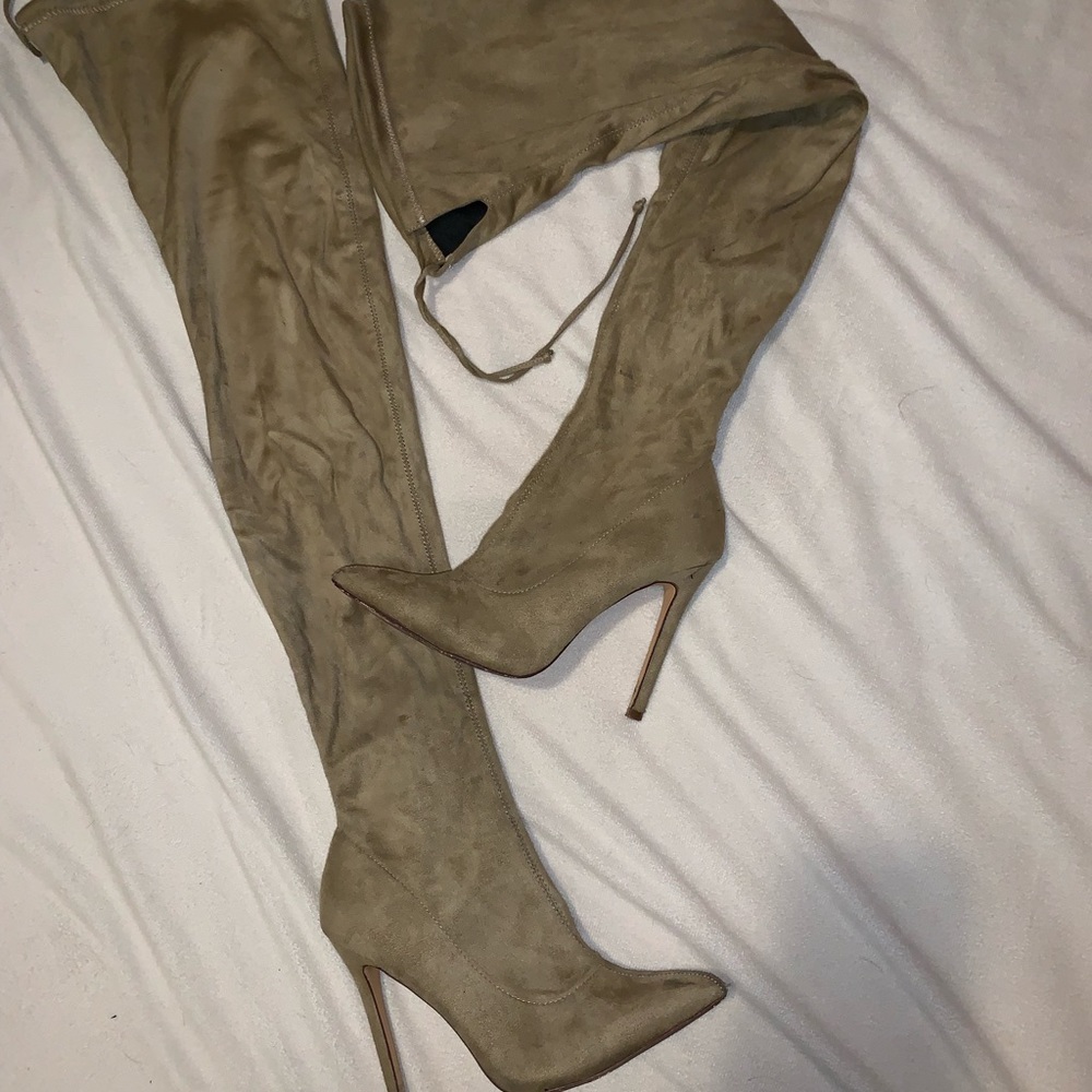 Thigh high heeled boots